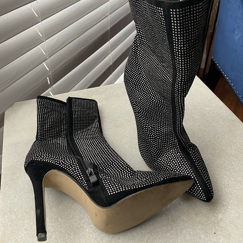 Black studded boots.